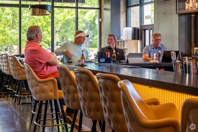 You can grab a drink with friends at The Office Craft Bar & Kitchen.