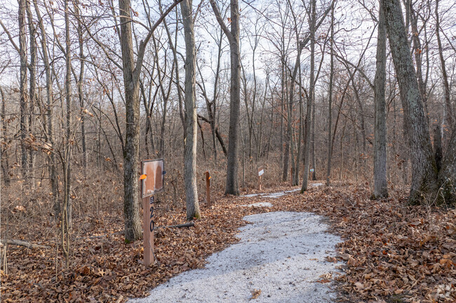 Meadows Parkway has a story waking trail through the woods.
