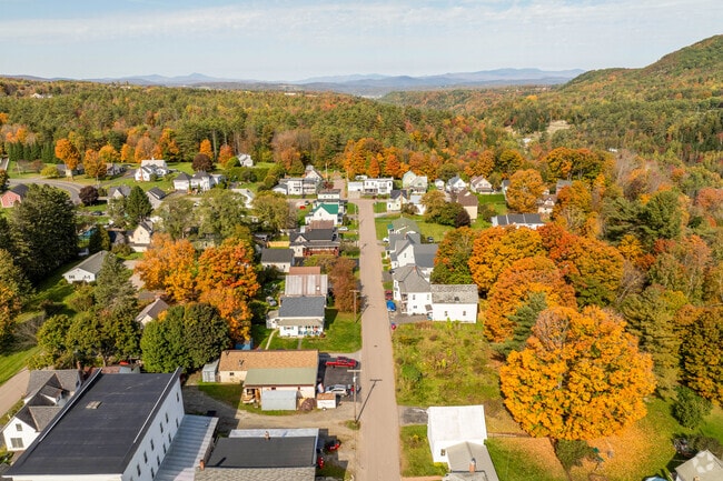 Hilly residential neighborhood of East Barre offers single and multifamily homes, combining rural privacy with community connectivity.