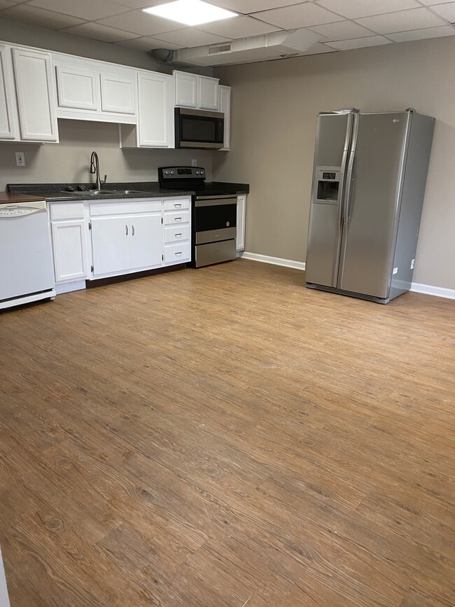 Kitchen with new stove/microwave