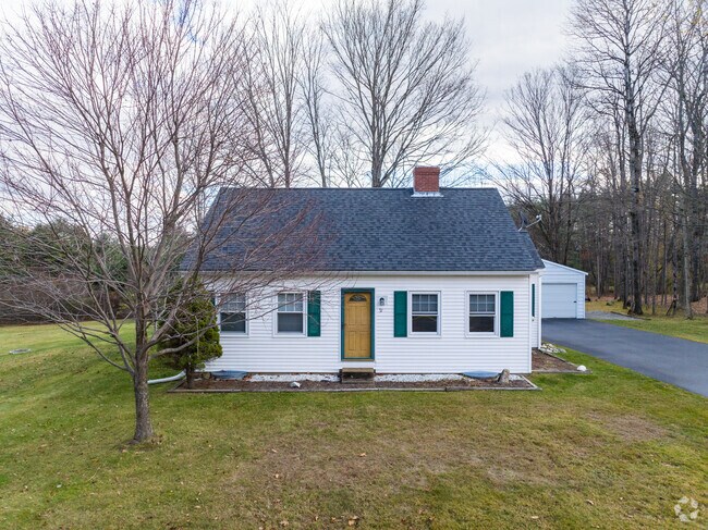 Charming Cape Cod in Dunbarton, blending classic New England style with cozy, timeless appeal.