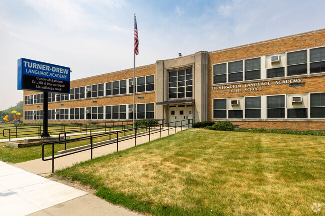 Turner-Drew Language Academy flag and entrance sign, Chicago, IL.