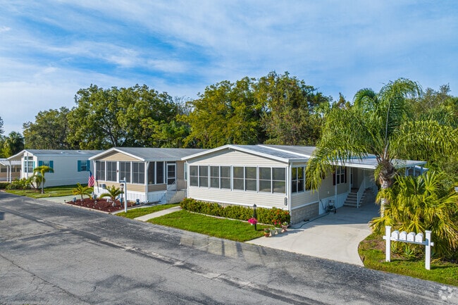 Double wides with well kept landscaping line the streets of Skyway Village in Memphis.