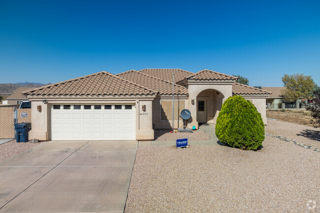 Properties in Valle Vista sit on quiet, residential roads with views of the Cerbat Mountains.