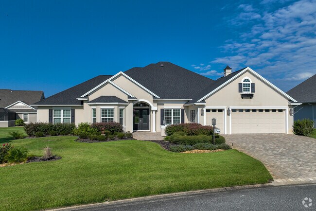 A beautiful designer-style home sits on Viking Place in the Village of Osceola Hills.