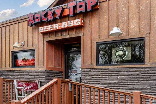 Lansing Avenue Heights locals sip a freshly poured craft beer from  Rocky Top Beer BBQ.