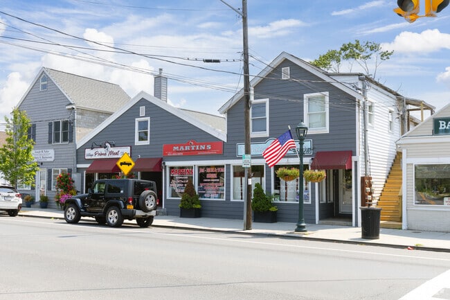 East Quogue’s Montauk Highway features shops like Martin’s and Village Prime Meat Shoppe.