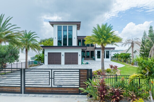 This two-story new-construction home sits right on the Halifax River in Daytona Beach Shores.
