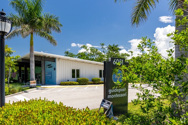 Guidepost Montessori at Naples welcomes students with a prominent sign at the entrance.