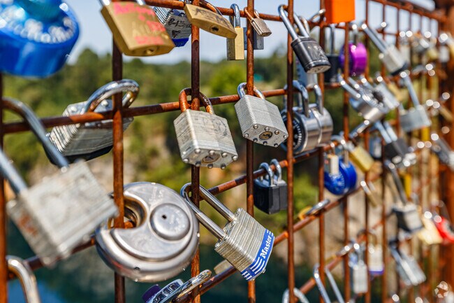 Visitors from far and wide contribute locks to The Quarry at Grant Park as a symbolic gesture.