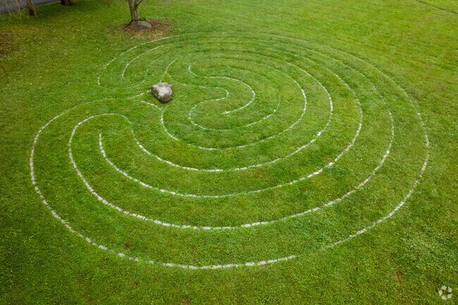 A whimsical labyrinth is a well-known landmark in the art village of Arden.