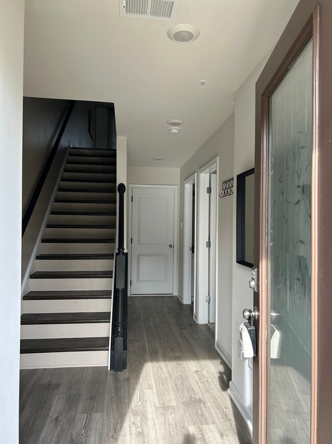 Entryway - Ground Level (Two-car garage behind the white door)