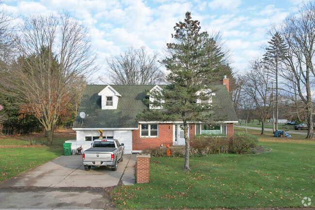 Homes in the Sardinia community have immaculate lawns.
