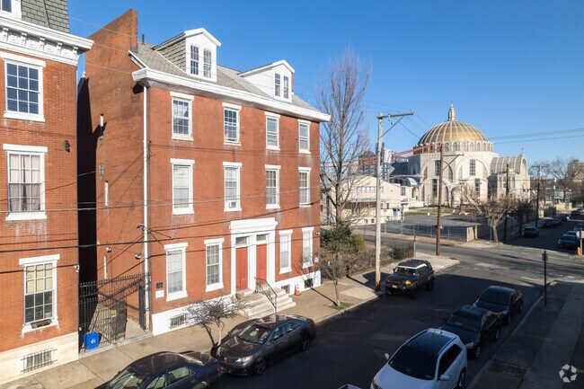 Homes on North Franklin Street in Poplar are next to Cathedral of the Immaculate Conception.