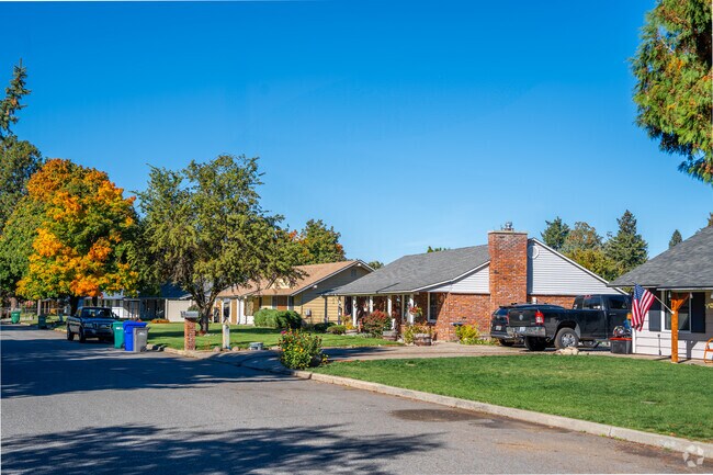 Homes in the Opportunity neighborhood have lush green gardens in the fall months.