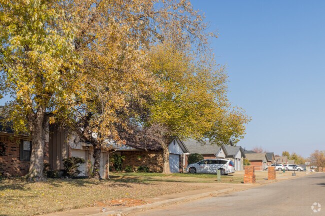 In Oak Brook, residents appreciate the large homes set amid dense, ancient trees.