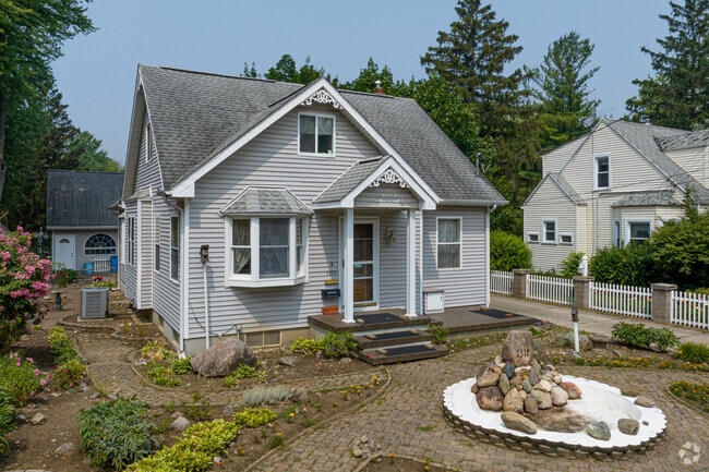 Traditional-style homes with beautiful landscaping can be found in Bassett Park.