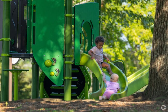 The neighborhood features several colorful playgrounds and parks with walking trails.