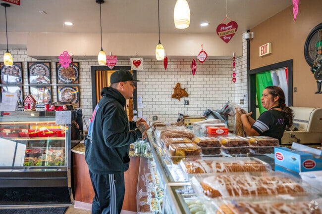 pick up fresh bread from Scordato Bakery Inc in Honey Manor neighborhood.