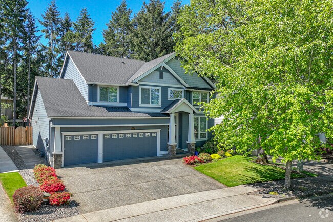 You will find newer Millennial Mansions with Craftsman facades in the Five Oaks neighborhood.