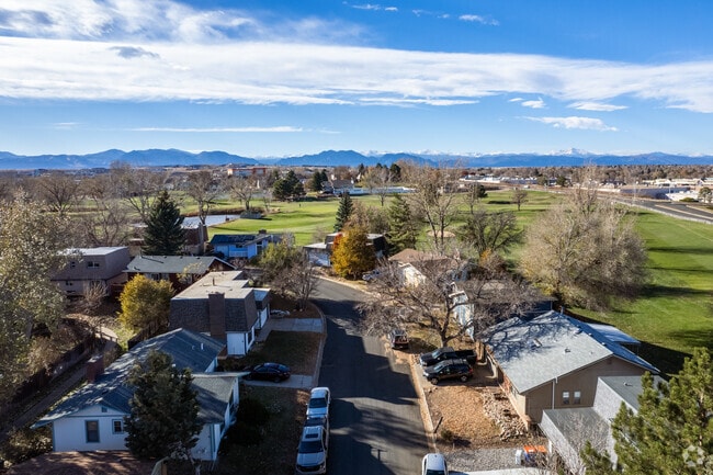 Homes lining the Greenway Park Golf Course in Broomfield, Colorado, offer stunning views of the mountains.