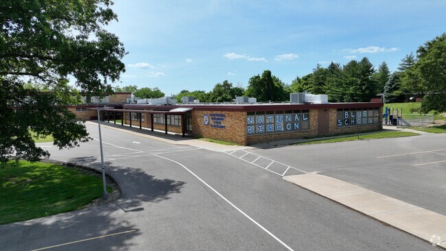 Bus drop-off entrance at the front of the school.
