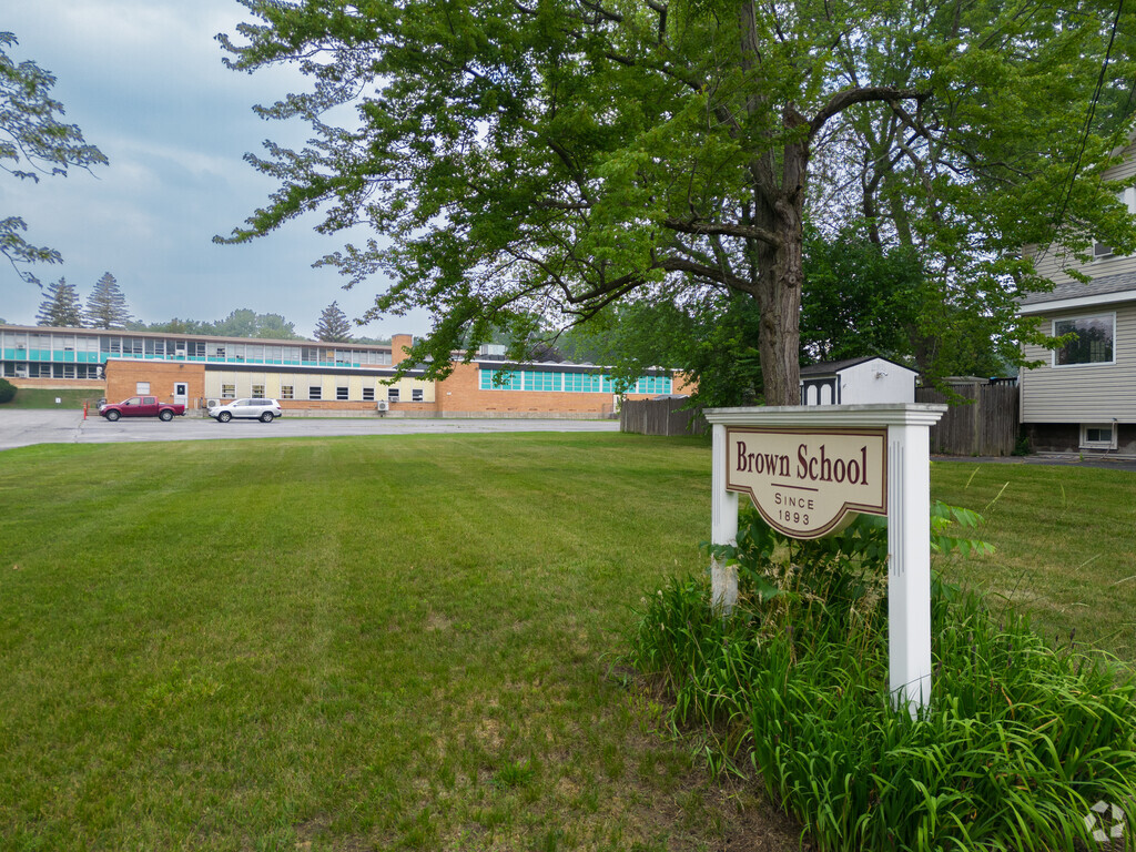 Brown School sign is very visible to residents as they pass by.