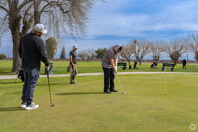 Three East Delano friends play a round of golf at the public golf course.