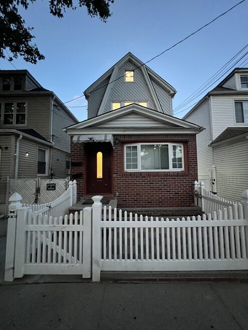 10719 90th St unit Ozone Park second fl, Ozone Park, NY 11417 - photo 1