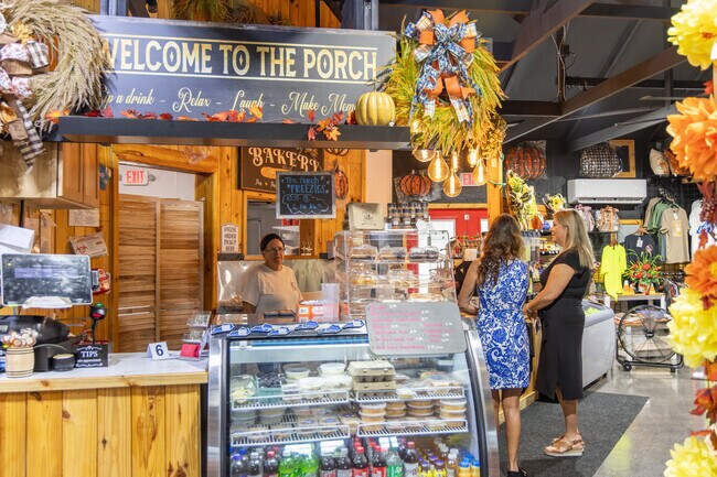Residents of Muddy Ford get local honey and crocheted crafts at The Porch Breakfast & Brunch.