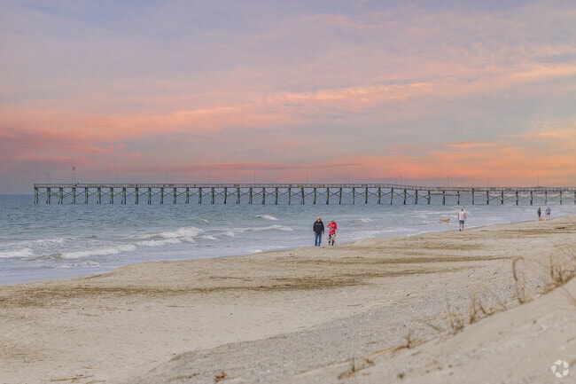 Oak Island is the best beach to go for a sunset stroll near Saint James.