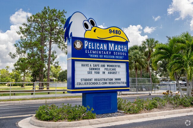 Pelican Marsh Elementary School in Naples has a large entrance sign welcoming students.