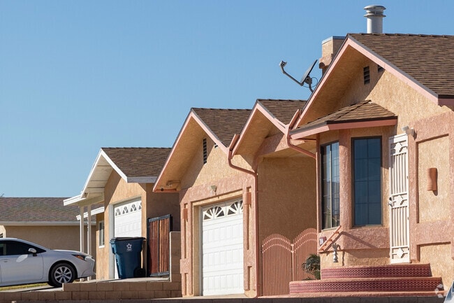 In Needles, homes stand like sentinels, painted in hues that mirror the desert sunset.