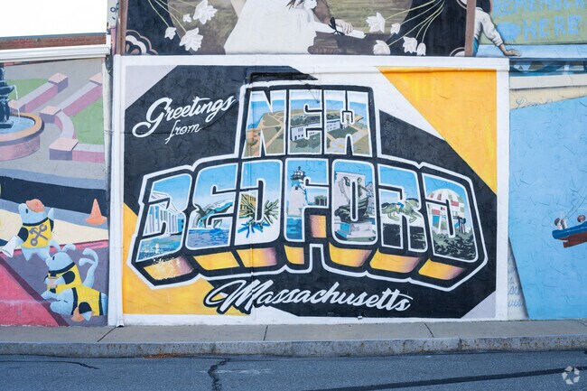 Uncover the colorful murals of New Bedford, a short jaunt from Fairhaven.