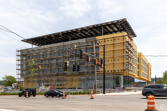 The new Walmart headquarters has a childcare center, hotel, auditorium, and ampitheater.
