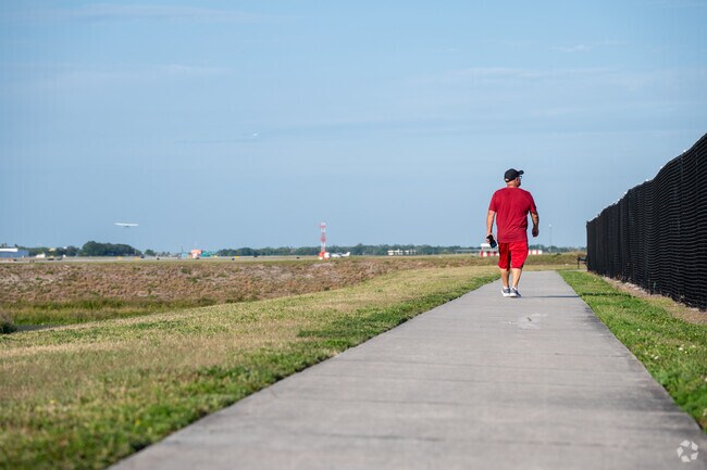 Residents of Dover head to Kittinger Park to enjoy views of airplanes at the adjacent airport.