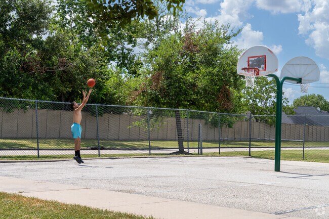 Buffalo Run locals hit the courts for a game of basketball.