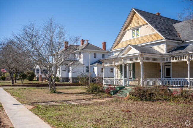 Rows of beautiful Victorian style homes line the streets in Butts County.