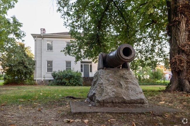 The historic McLoughlin House stands as a testament to the area’s pioneer heritage.