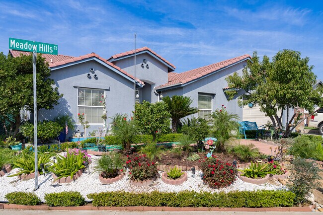 This Parkview Estates home adds character to their corner lot with beautiful flowers and plants.