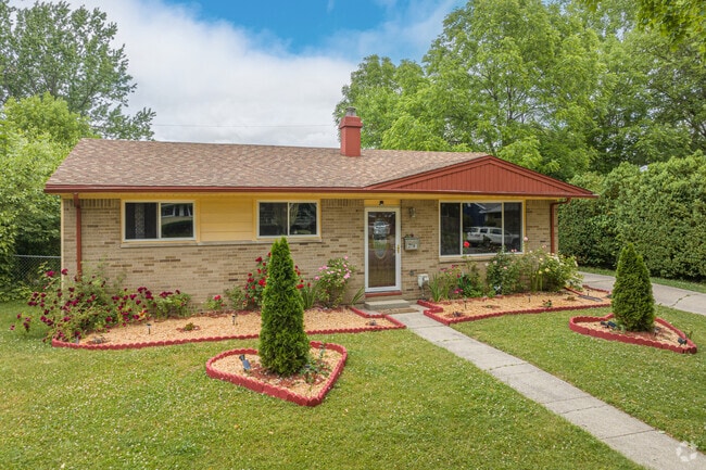 This unique ranch-style home with beautiful landscaping is in the Churchill Downs neighborhood.