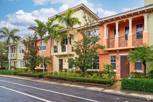 Colorful modern townhouses offer more space at affordable prices in Mango Groves.
