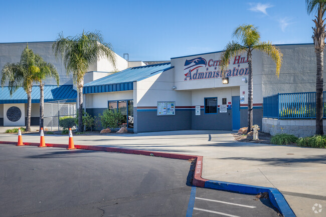 Palm trees are seen growing at the entrance to Citrus Hill High School in Perris.