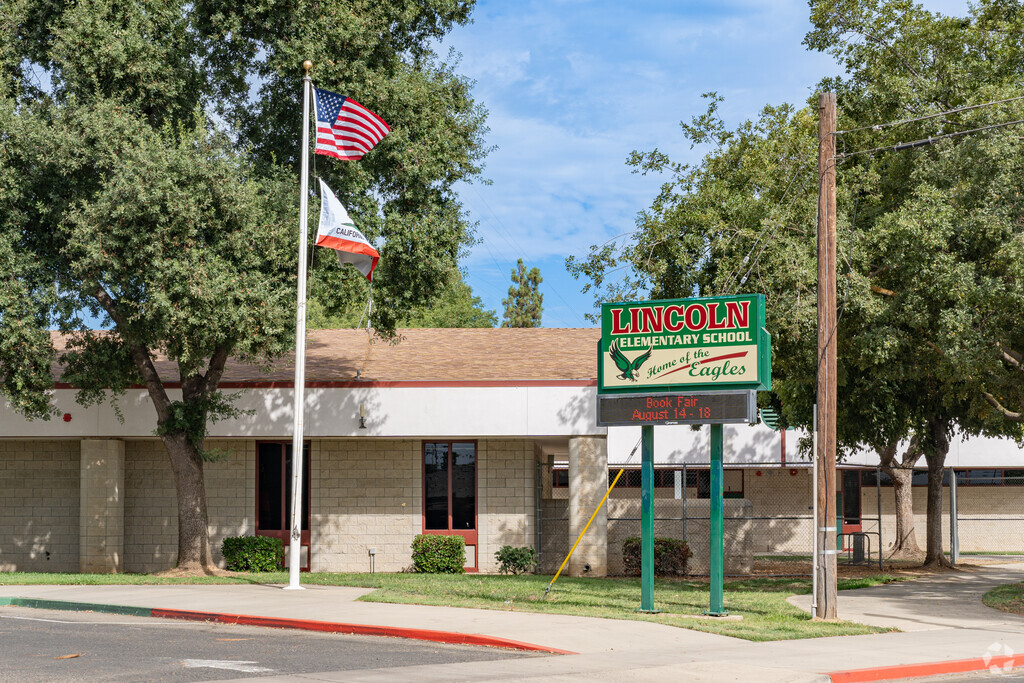 Marquee and flags outside the entrance to Lincoln Elementary School.