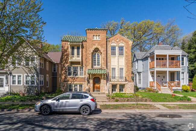 A charming, historic brick condominium building in the South Uptown, neighborhood.