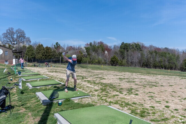 You can practice your golf swing at Kernersville Golf Center in Macy Grove.