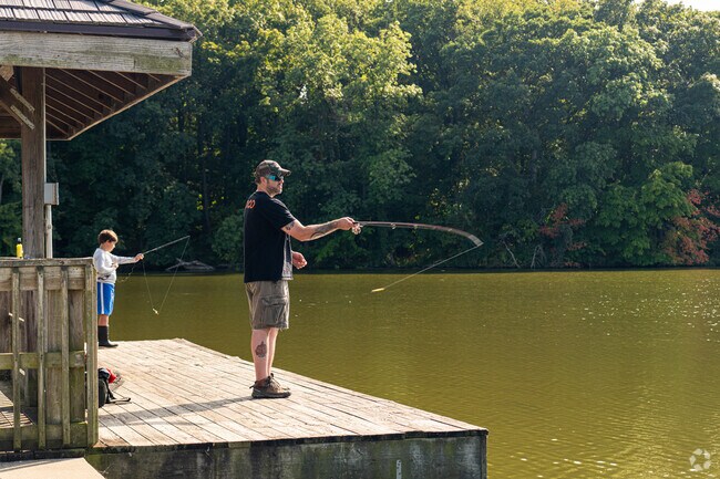 A father and son spend a day fishing at Sportsman Park in Decatur, IL.