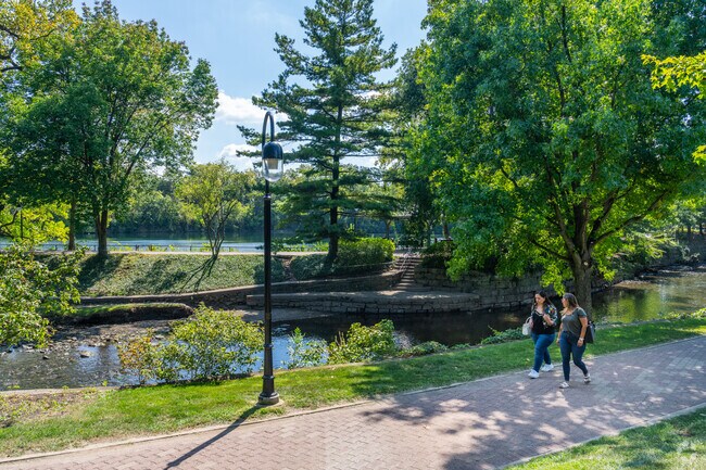 Take a walk with friends on The Naperville Riverwalk.