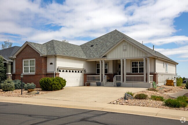 New traditional homes in the Heritage Todd Creek neighborhood have farmhouse elements