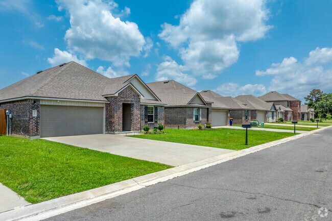 Brick single-family homes stand proudly along the quiet streets of Jennings.